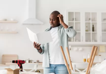 confused man having hard time estimate kitchen countertop investment