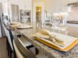 Abstract of Beautiful Kitchen Granite Counter Place Settings and Chairs