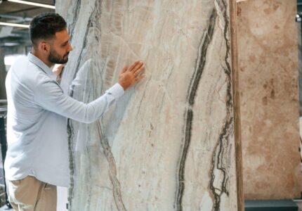 Huge tile, for floor or wall. Man is in the hardware shop